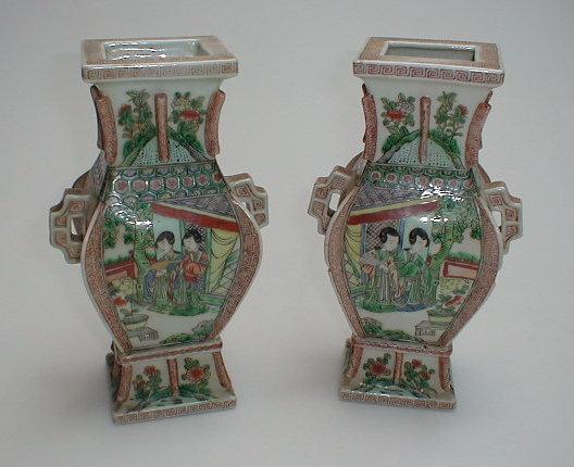 Appraisal: A pair of Chinese two handled vases of oblong baluster