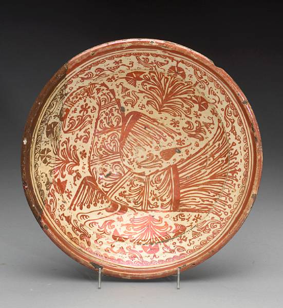 Appraisal: A Hispano-Moresque copper luster pottery bowl th century Decorated with