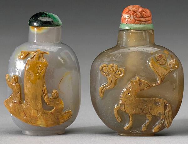 Appraisal: Four agate snuff bottles th Century The first of Suzhou