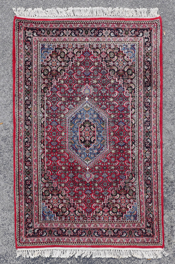 Appraisal: APPROX - YR OLD INDO-PERSIAN HAND KNOTTED WOOL RUG '