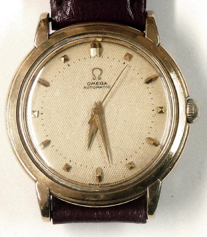 Appraisal: Omega 's gold capped automatic gentleman's wristwatch the textured dial