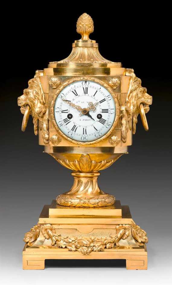 Appraisal: IMPORTANT CLOCK AUX TETES DE LIONS Louis XVI the model