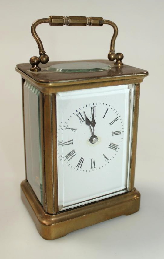 Appraisal: A thC brass carriage clock with swing handle the cm