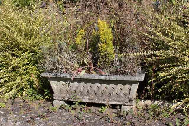 Appraisal: A SET OF FOUR RECONSTITUTED STONE RECTANGULAR PLANTERS of tapering