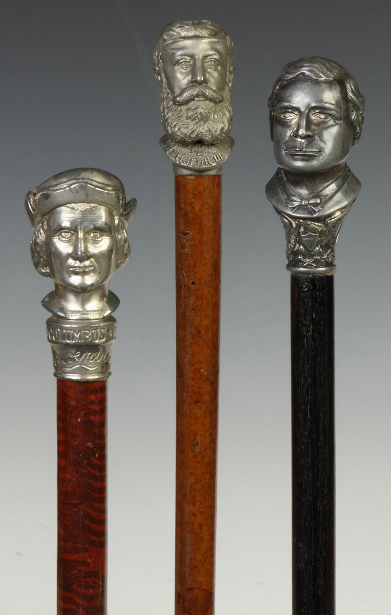 Appraisal: Three Canes with Faces L to R Columbus Exposition Chicago