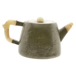 Appraisal: A Yixing Pewter-Encased Teapot The ovoid form body is incised