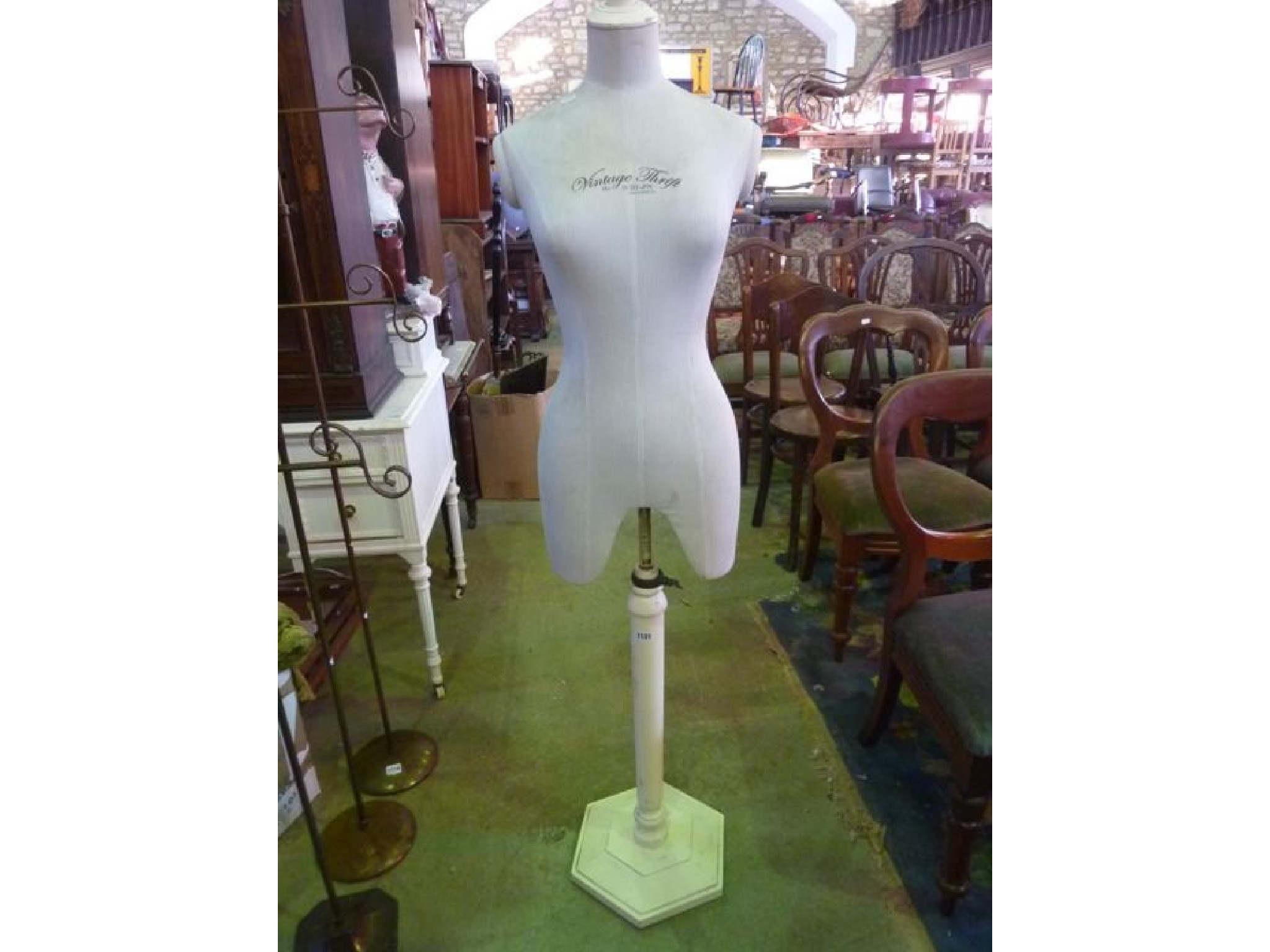 Appraisal: A shop display dummy female torso with printed lettering Vintage