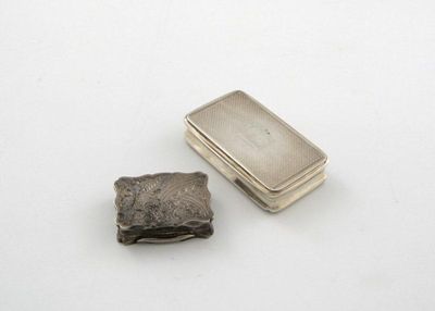 Appraisal: A Victorian silver snuff box shaped rectangular form engraved decoration