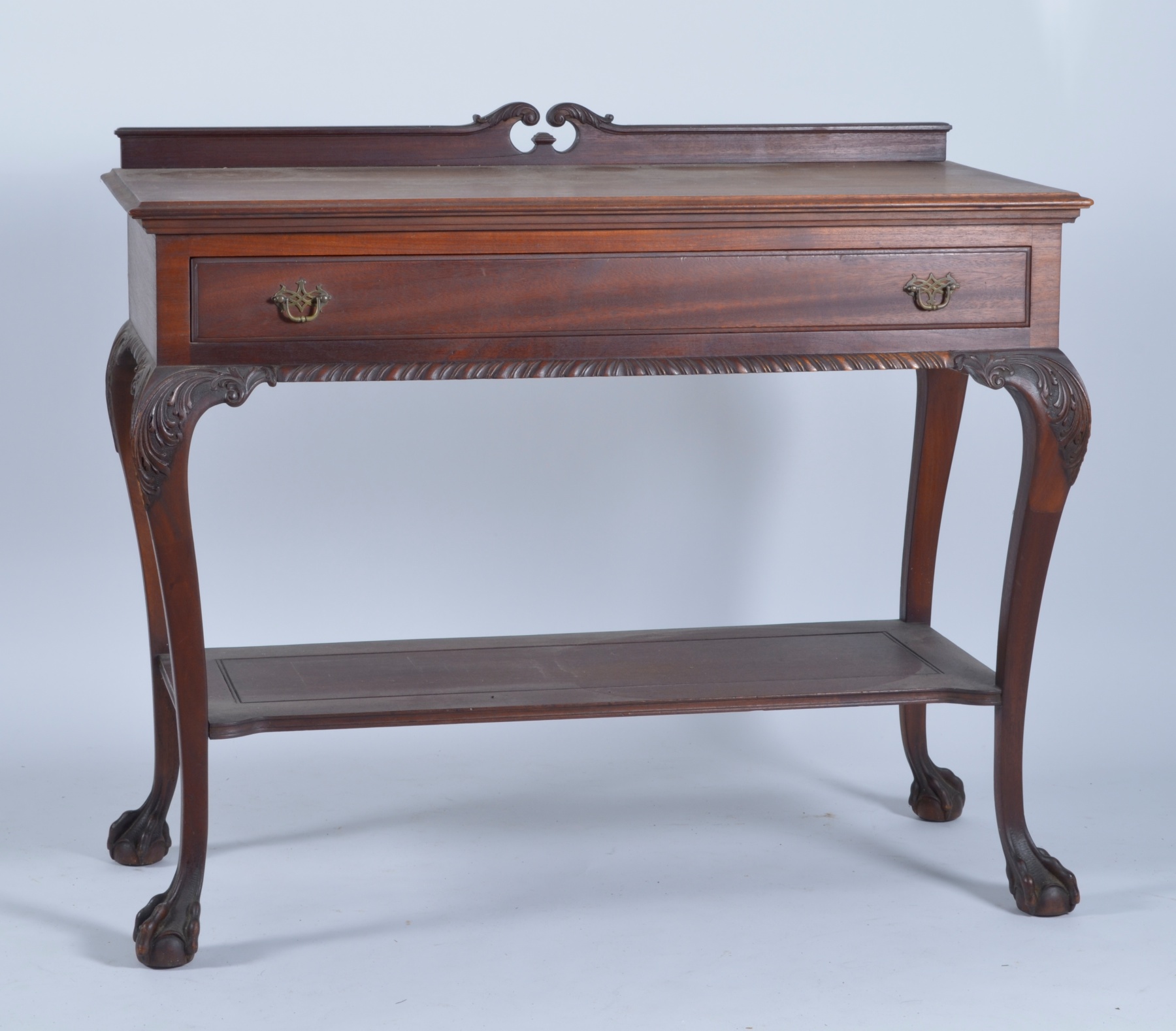 Appraisal: CHIPPENDALE-STYLE ONE-DRAWER SERVER in mahogany with claw ball feet Height