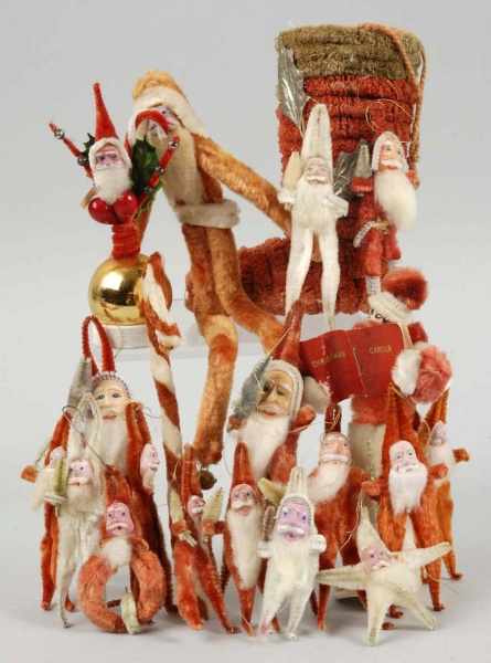 Appraisal: Lot of Chenille Santa Ornaments Candy Container Description Includes one