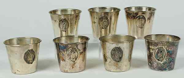 Appraisal: English Silverplated Pimms Cups English includes seven silverplated Pimms cups