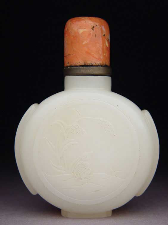 Appraisal: CARVED WHITE JADE SNUFF BOTTLE Finely hollowed carved white jade