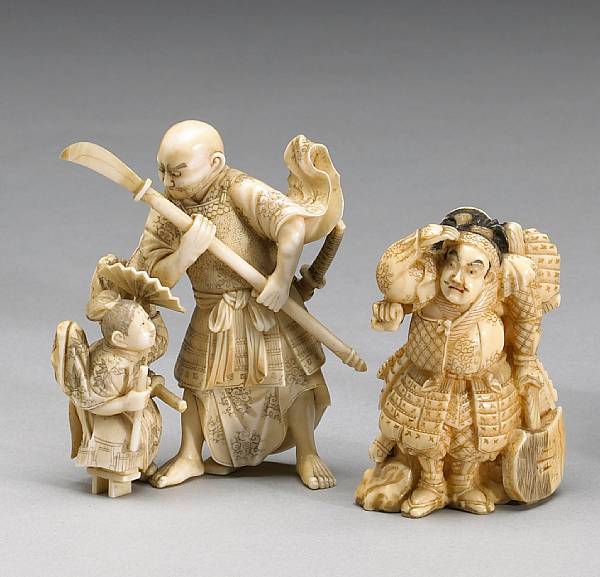 Appraisal: Two ivory figural okimono The first portraying the famous confrontation