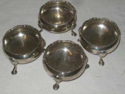 Appraisal: A SET OF FOUR VICTORIAN SALTS of circular form with