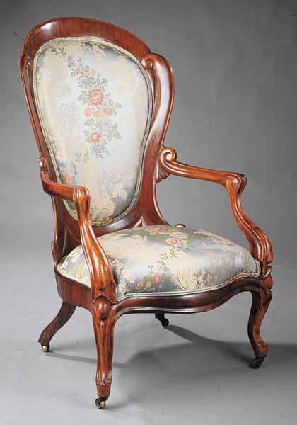 Appraisal: An American Rococo Laminated and Rosewood Armchair mid- th c