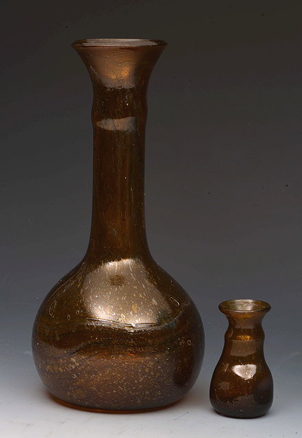 Appraisal: James Couper Sons attributed to A 'Clutha' style brown glass