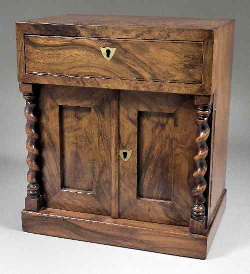 Appraisal: A Victorian figured walnut collector's cabinet with upper drawer the