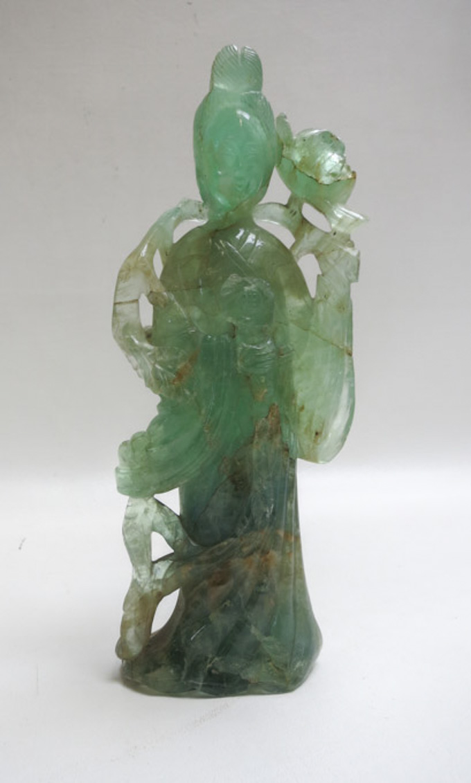 Appraisal: CHINESE GREEN TOURMALINE SCULPTURE of Guanyin standing figure with flowering