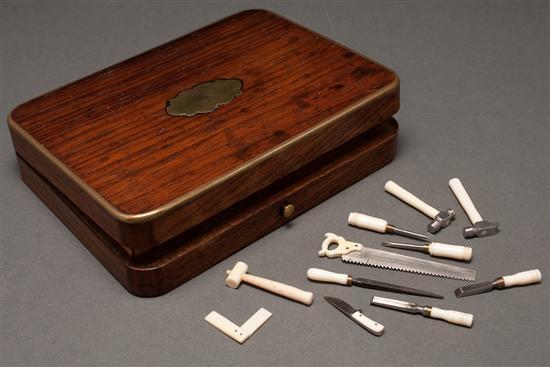 Appraisal: Continental rosewood box and ivory-handled miniature tools late th century