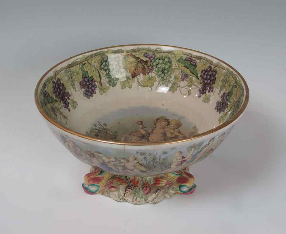 Appraisal: GILDEA WALKER STAFFORDSHIRE DOLPHIN BASE PUNCH BOWL Ca 's Figural