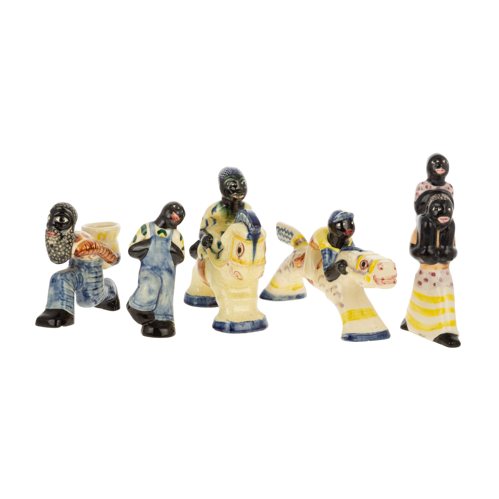 Appraisal: FIVE SHEARWATER POTTERY FIGURES African American folk glazed pottery figures