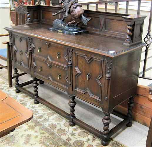 Appraisal: CHARLES II STYLE OAK SIDEBOARD English c dark oak construction