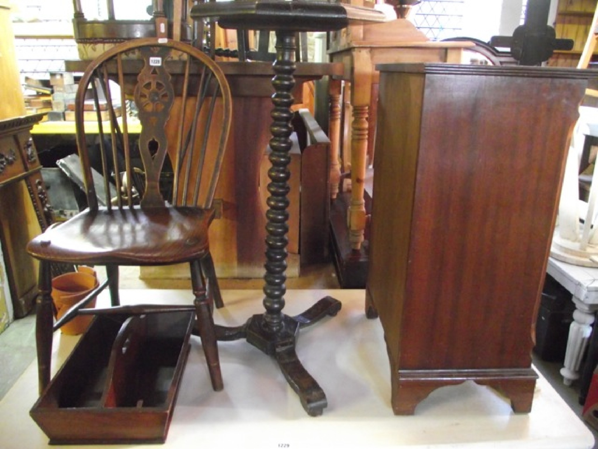 Appraisal: A th century Windsor elm and ashwood wheel back kitchen