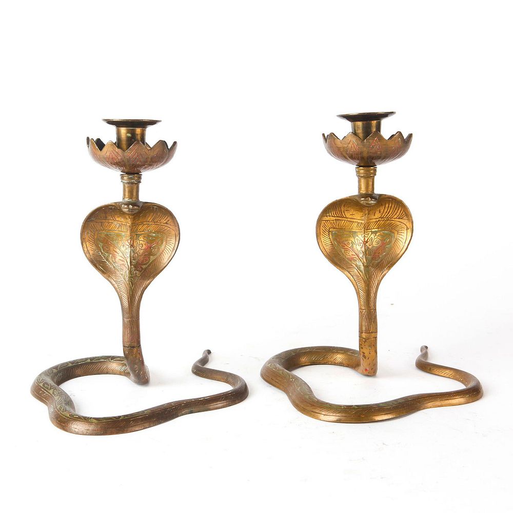 Appraisal: PAIR OF BRONZE INDIAN COBRA CANDLE STANDS Engraved designs and