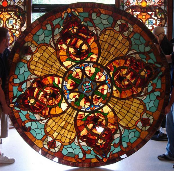 Appraisal: Round stained glass panel floral geometric design some cracks and