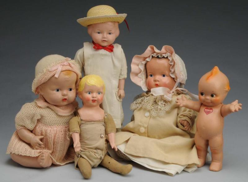 Appraisal: Lot of Composition Dolls Description American Rose O Neill Kewpie