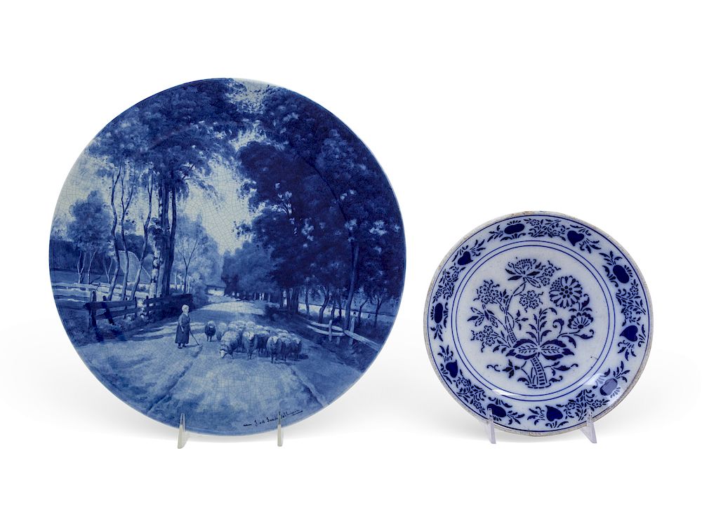 Appraisal: Two Continental Blue and White Glazed Earthenware Plates Two Continental