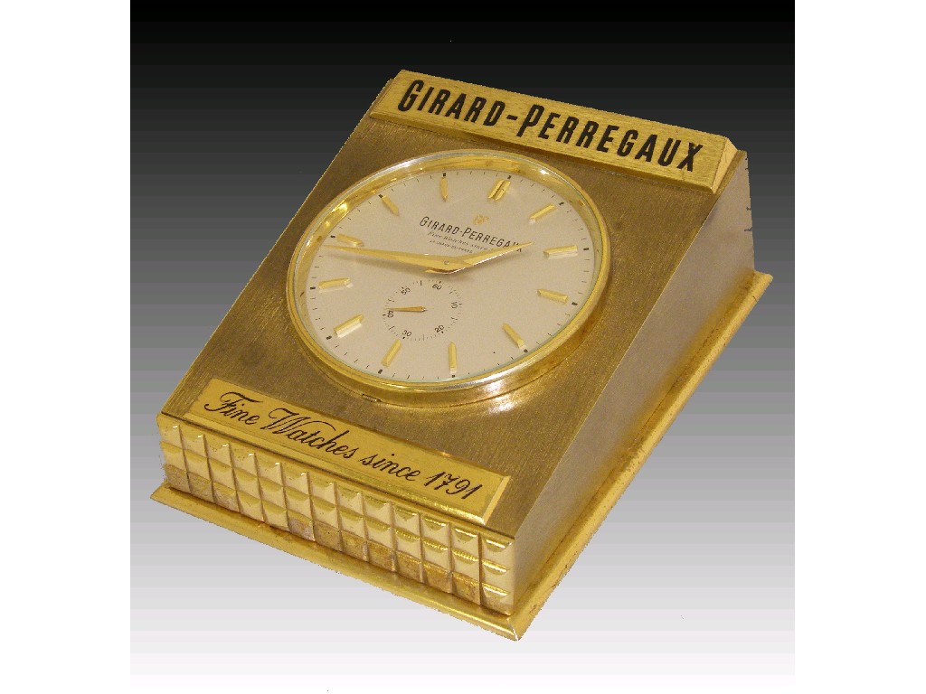 Appraisal: Girard-Perregaux advertising desk timepiece the silvered dial with baton markers