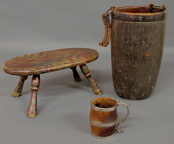 Appraisal: Paint decorated milking stool h x l leather fire bucket