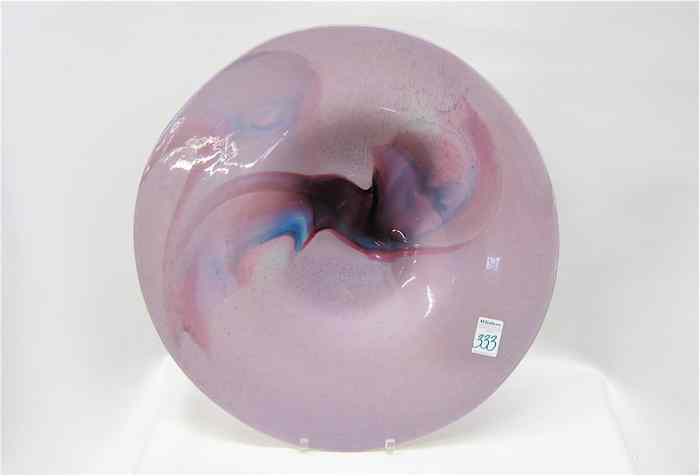 Appraisal: ART GLASS CHARGER multi-color accents on pale mauve ground Artist