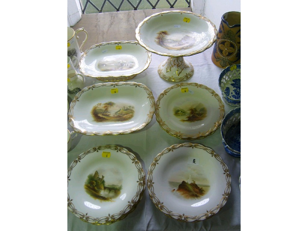 Appraisal: A th century dessert set with painted landscape panels on