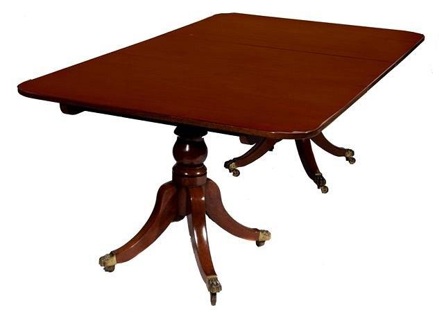 Appraisal: A LATE GEORGIAN MAHOGANY EXTENDING DINING TABLE constructed two tip