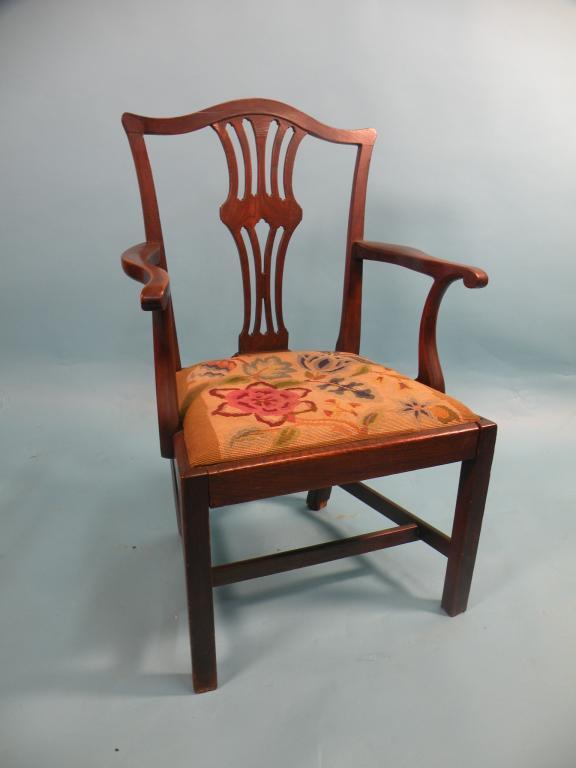 Appraisal: A George III country made elm open armchair with a