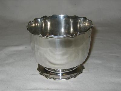 Appraisal: A SUGAR BOWL of circular form with moulded Chippendale rim