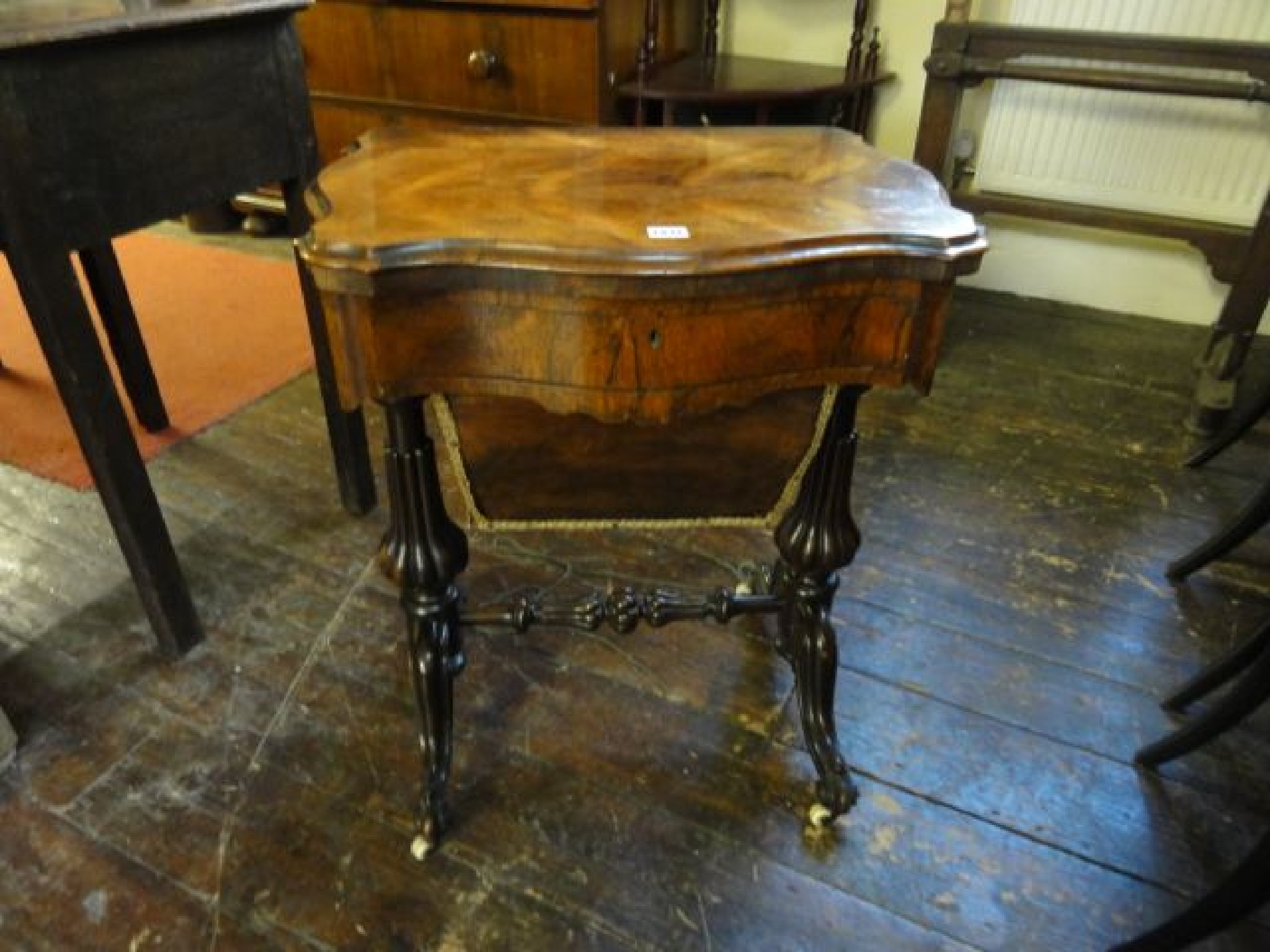 Appraisal: A mid th century rosewood ladies occasional table the fold