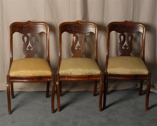 Appraisal: Classical Mahogany Side Chairs with swan neck pierced slats slip