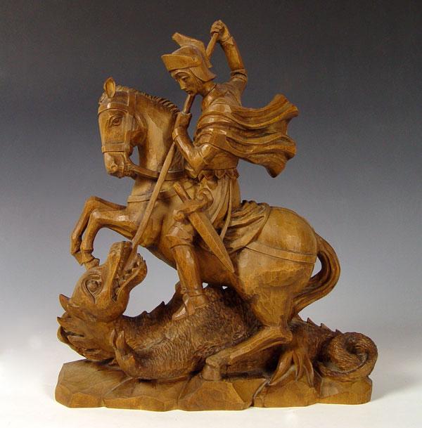 Appraisal: CARVED WOOD ST GEORGE DRAGON Measures '' h x ''