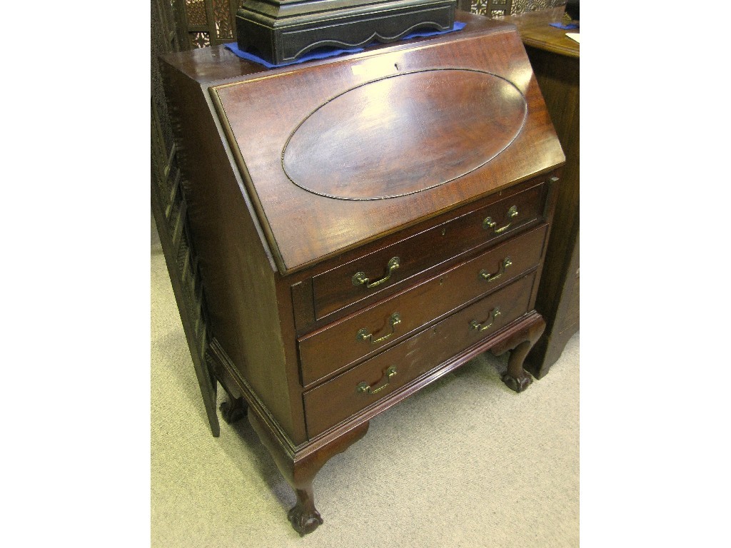 Appraisal: Mahogany slopefront writing bureau on ball and claw feet