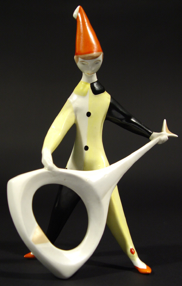 Appraisal: s Continental porcelain figure of a harlequin clutching a guitar