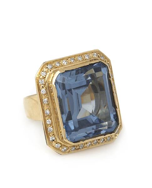 Appraisal: A topaz diamond and gold ring with a citrine and