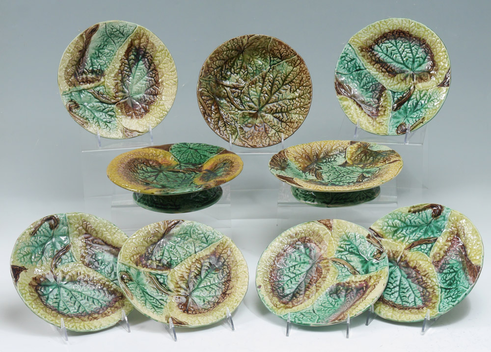 Appraisal: MAJOLICA LEAF DESIGN PLATES AND COMPOTES Deep crisp leaf design