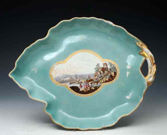 Appraisal: A GERMAN PORCELAIN LEAF SHAPED PLATE with central painted quatrefoil