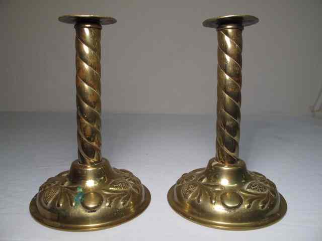 Appraisal: A pair of th century English brass candlesticks barley twist