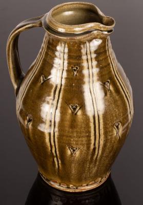 Appraisal: Mike Dodd born tall stoneware jug green ash glaze with