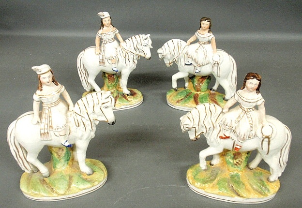 Appraisal: - Two pairs of Staffordshire Royal Children on horseback c