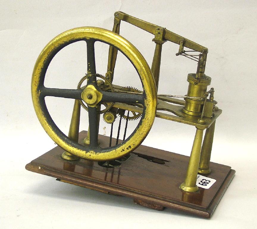 Appraisal: Small brass model steam engine mounted upon a rectangular mahogany